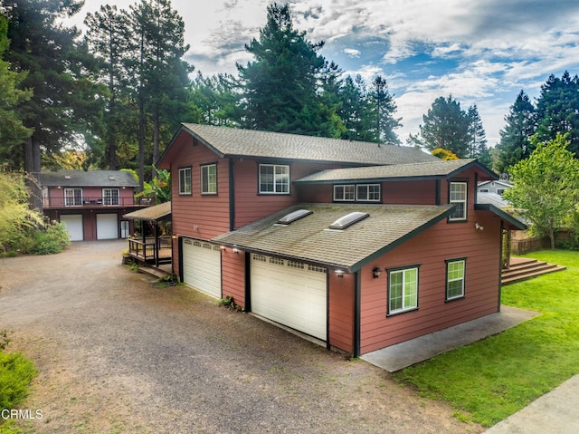 front of property with a garage