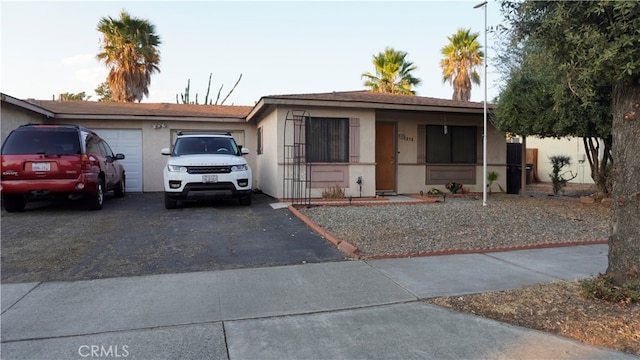 view of front of home with a garage