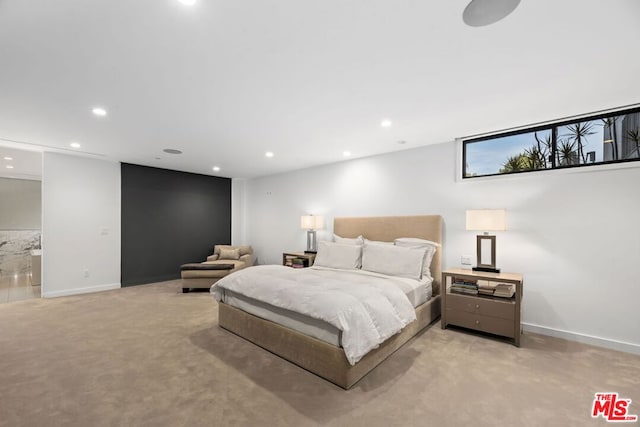 bedroom with light colored carpet