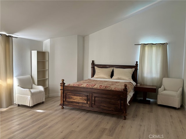 bedroom featuring light hardwood / wood-style flooring