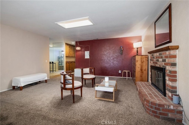 living room featuring carpet floors and a brick fireplace