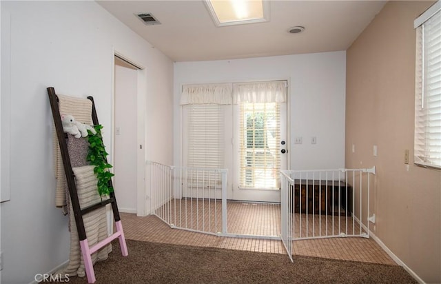 entryway featuring carpet