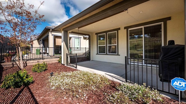 view of home's exterior with a patio area