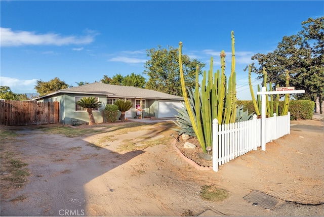 ranch-style home with a garage