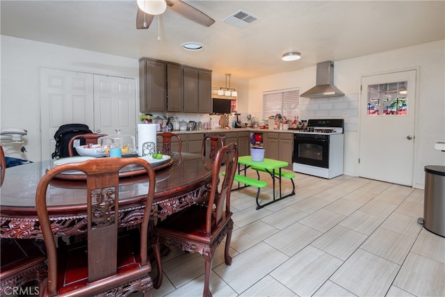 dining area with ceiling fan