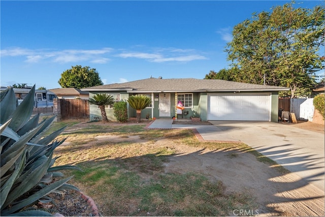 ranch-style home featuring a garage