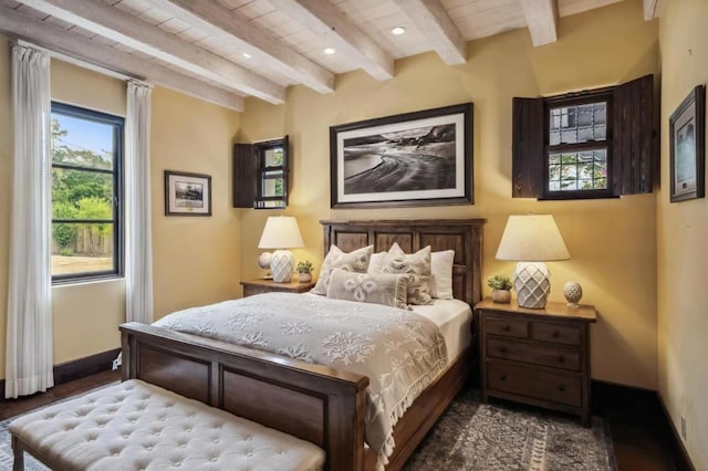 bedroom featuring beam ceiling and wood-type flooring