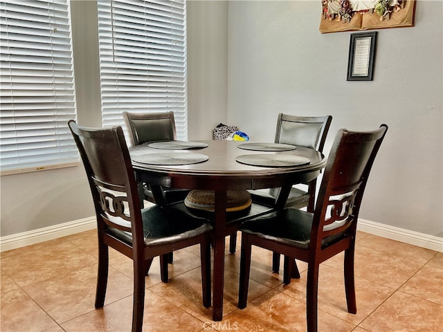 dining room with light tile patterned floors