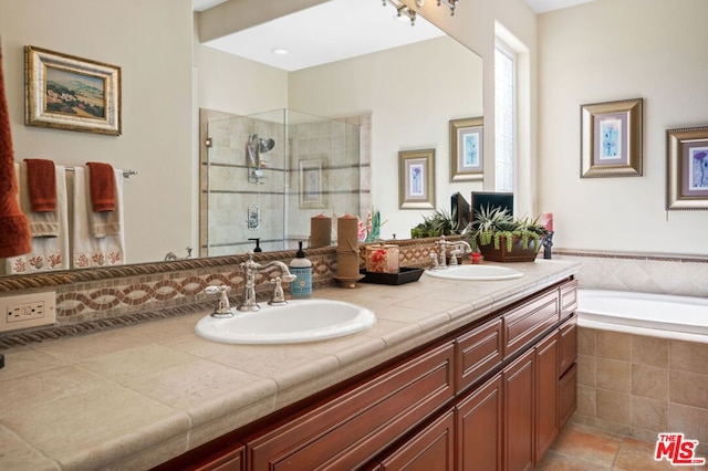 bathroom with vanity, separate shower and tub, and tile patterned floors