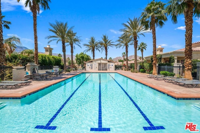 view of pool featuring a patio area