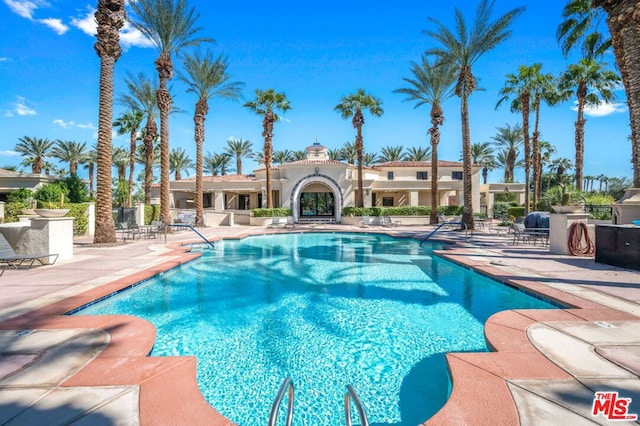 view of pool with a patio area