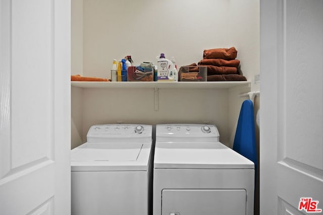 clothes washing area with independent washer and dryer