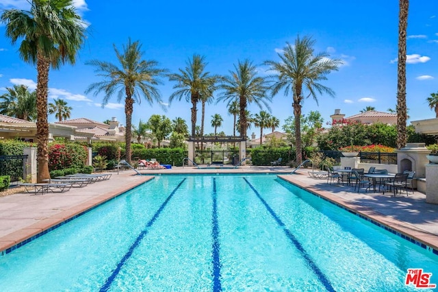 view of pool featuring a patio area