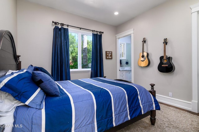 bedroom featuring ensuite bathroom