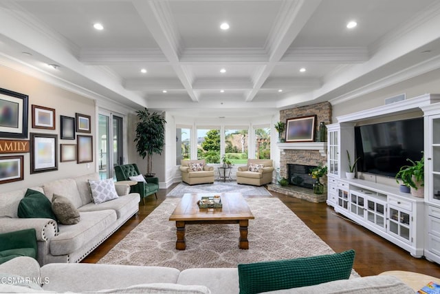 living room with crown molding, dark hardwood / wood-style floors, coffered ceiling, a stone fireplace, and beamed ceiling