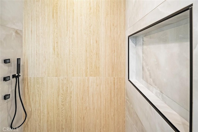 interior details featuring walk in shower