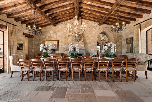 dining room featuring wooden ceiling, high vaulted ceiling, beam ceiling, and a notable chandelier