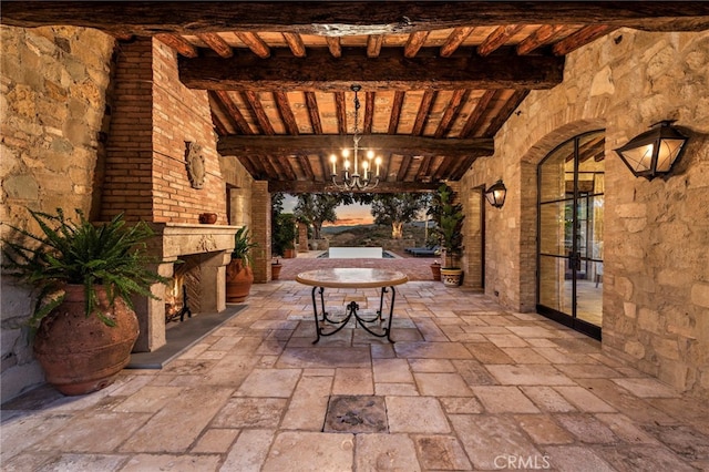 view of patio terrace at dusk