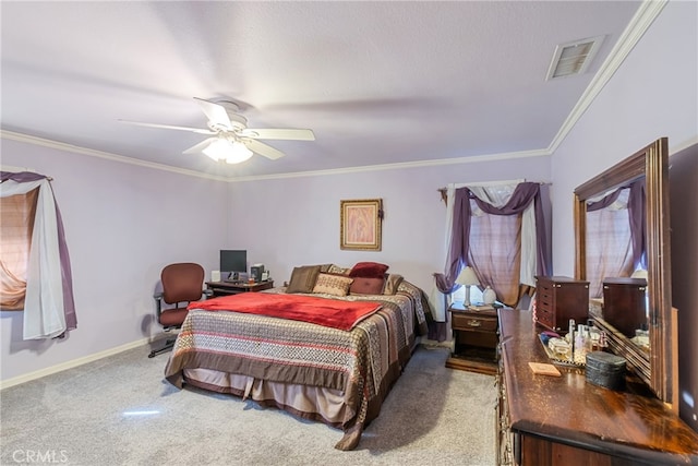 bedroom with ceiling fan, carpet floors, and crown molding