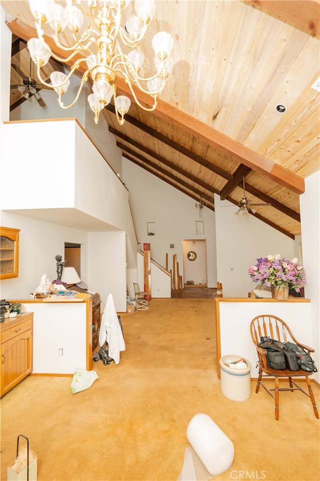 interior space with ceiling fan with notable chandelier, wood ceiling, beamed ceiling, and high vaulted ceiling