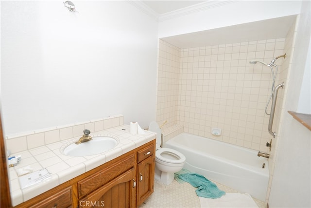 full bathroom featuring tiled shower / bath combo, tile patterned floors, ornamental molding, vanity, and toilet