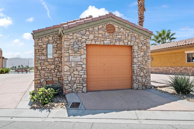 garage featuring a mountain view