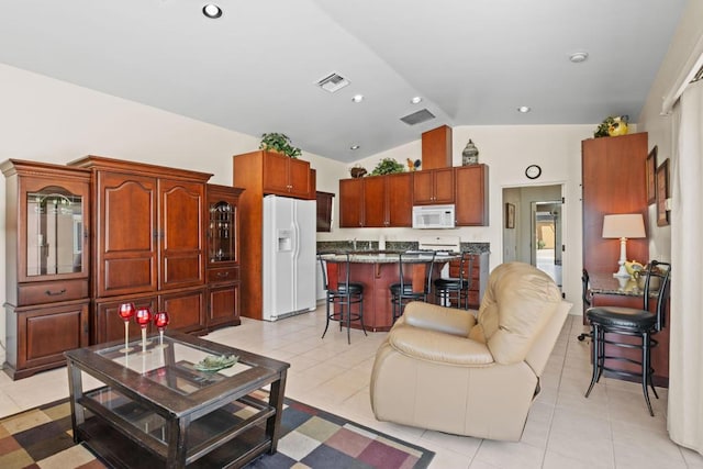 tiled living room with lofted ceiling