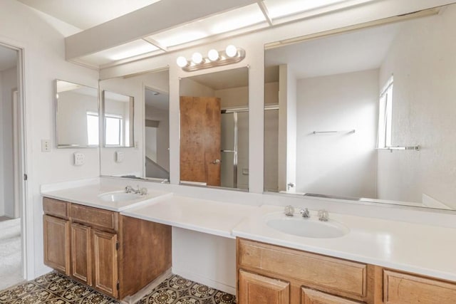 bathroom with vanity and walk in shower