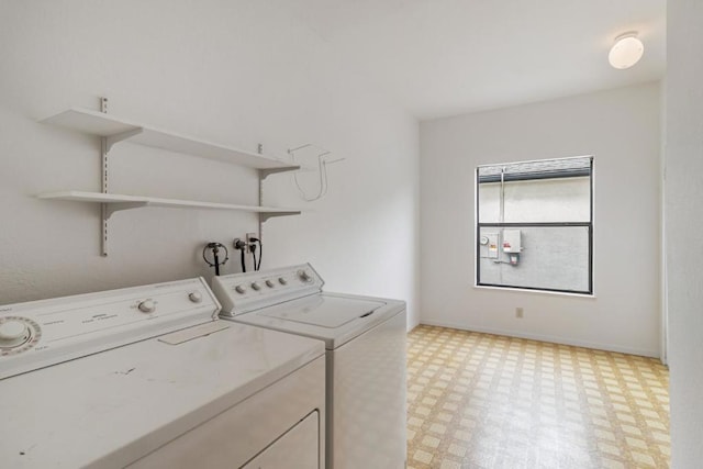 clothes washing area with independent washer and dryer