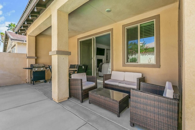 view of patio / terrace with area for grilling and an outdoor hangout area