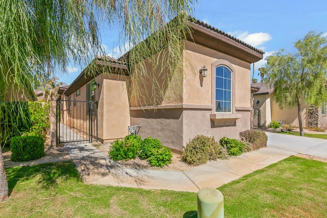 view of front of home with a front yard