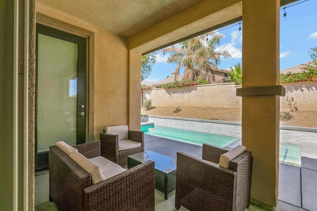 exterior space with a fenced in pool and an outdoor hangout area