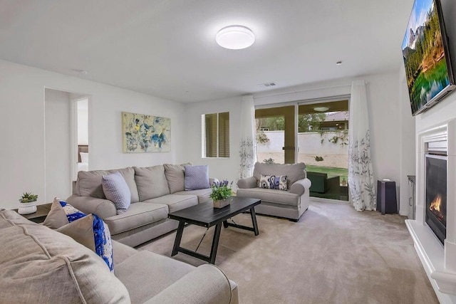 living room with light colored carpet