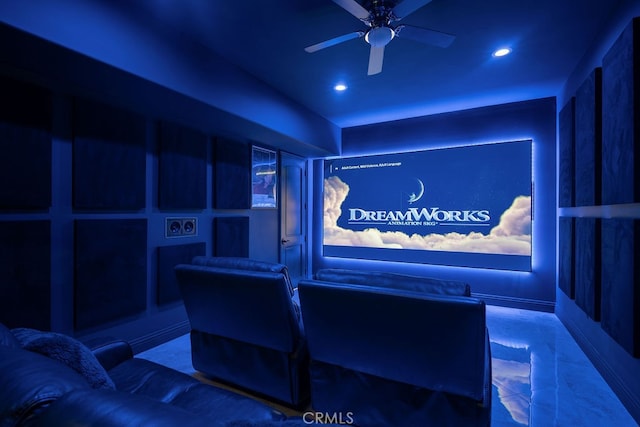 cinema room with ceiling fan