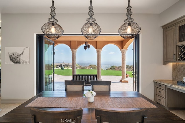 dining area featuring a wealth of natural light