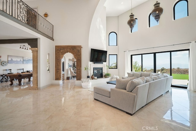 living room with a towering ceiling