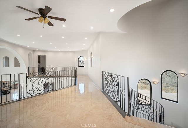 hallway featuring plenty of natural light