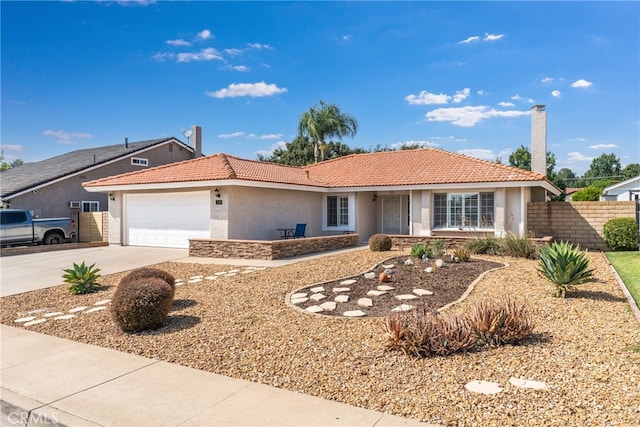 single story home featuring a garage