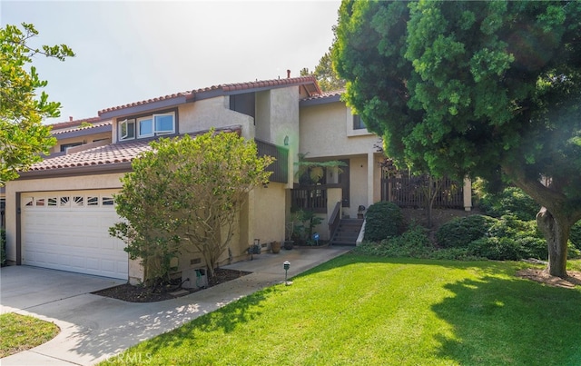 mediterranean / spanish home with a front yard