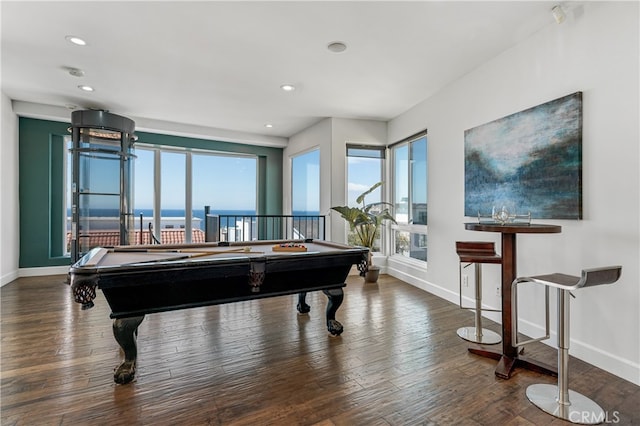 game room featuring dark wood-type flooring, billiards, and plenty of natural light