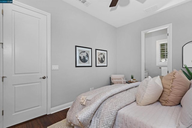 bedroom with ceiling fan and dark wood-type flooring