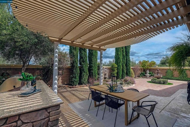 view of patio featuring a pergola