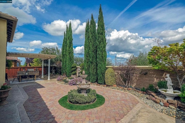 view of patio / terrace featuring a pergola