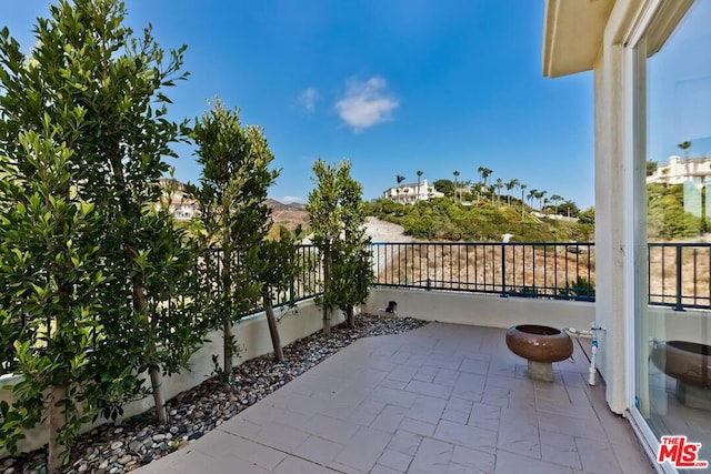 view of patio / terrace featuring a balcony