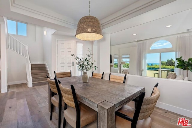 dining room with light wood-type flooring