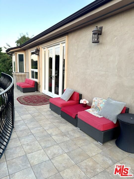 view of patio featuring french doors