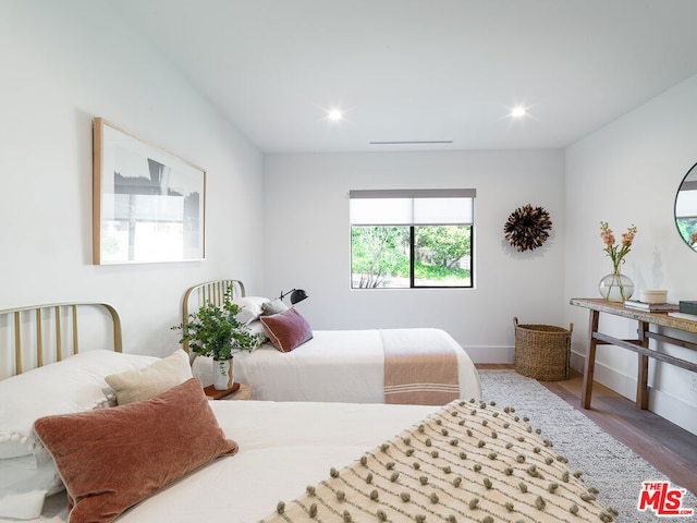 bedroom featuring hardwood / wood-style floors