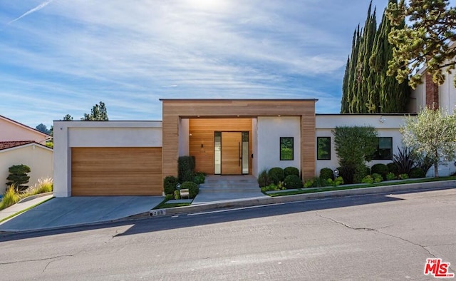 contemporary house featuring a garage