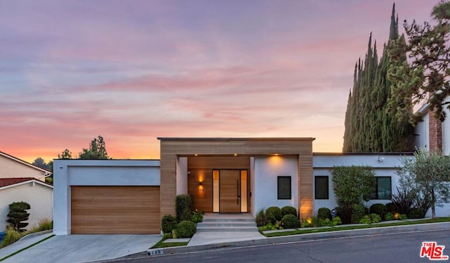 contemporary home with a garage