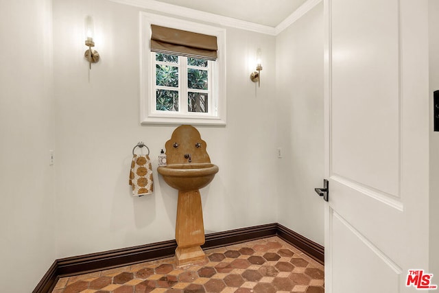 bathroom with crown molding